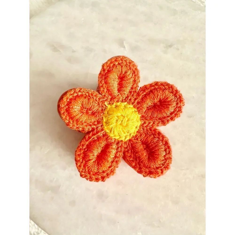 Orange and yellow crochet flower hair claw 